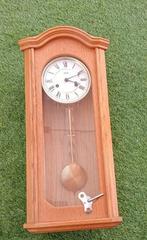 Blank eiken Jeka Wandklok.Hoogte 58 cm.In goede staat., Ophalen of Verzenden, Zo goed als nieuw