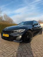 BMW 320i Touring M pakket / Pano / head up / elekt. Trekhaak, 1998 cc, Achterwielaandrijving, Zwart, 4 cilinders