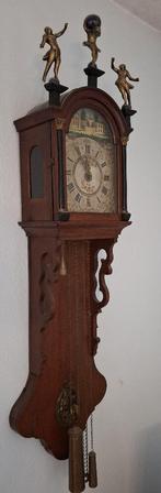 Antieke Friese staartklok, Ophalen