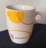 Senseo mok van Douwe Egberts (geel print). Hoogte 8,5 cm., Ophalen of Verzenden, Zo goed als nieuw, Overige stijlen, Kop(pen) en/of Schotel(s)