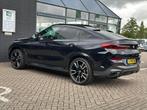 BMW X6 M50i High Executive/530-PK/DELERONDERHOUDEN/NL-AUTO N, Auto's, BMW, Gebruikt, 2210 kg, 4395 cc, Zwart