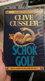 Clive Cussler - Schokgolf, Boeken, Thrillers, Nieuw, Clive Cussler, Ophalen of Verzenden, Nederland