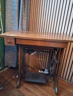 Singer naaimachine met tafel, Ophalen