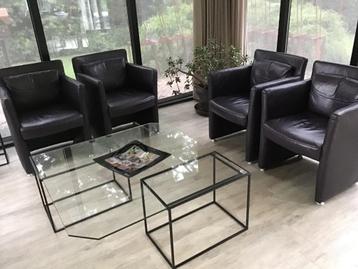  fauteuils in donker aubergineleer beschikbaar voor biedingen