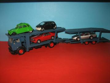 Auto-Transporter  MERCEDES blauw  met 4 luxe wagens beschikbaar voor biedingen