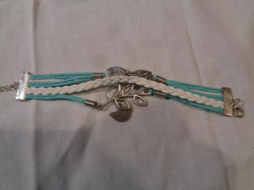 wit/blauw met uiltjes 21 cm  lang nr 1041 beschikbaar voor biedingen