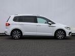 Volkswagen Touran 1.4 TSI Highline 7p 150pk DSG | R-Line | N, Auto's, Stof, Gebruikt, Euro 6, 4 cilinders