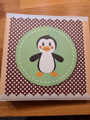 Leuk fotoalbum met pinguïn beschikbaar voor biedingen