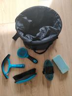 Poetstas paard met borstels, Ophalen