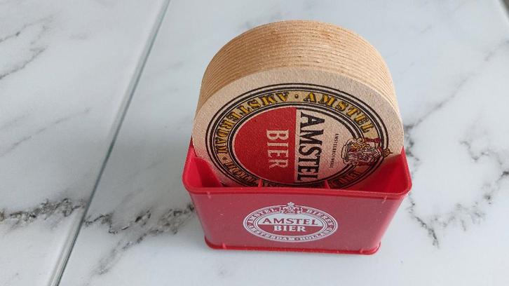 AMSTEL GOLD RACE 1983 BIERVILTJES (14ST) IN KRATJE., Verzamelen, Biermerken, Nieuw, Viltje(s), Overige merken, Ophalen of Verzenden