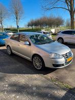 Volkswagen Jetta 1.4 TSI Comfortline (2010) Grijs, Auto's, Volkswagen, Voorwielaandrijving, Stof, Zwart, 4 cilinders