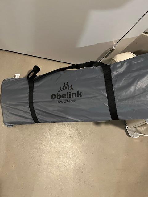 Windscherm.  Obelink 6 mtr. Doorzichtig, Ophalen, Zo goed als nieuw