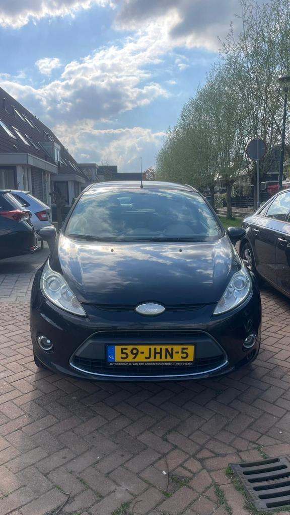 Ford Fiësta 1.25 60KW 3DR 2009 Zwart, Auto's, Voorwielaandrijving, 600 kg, 4 cilinders, Zwart