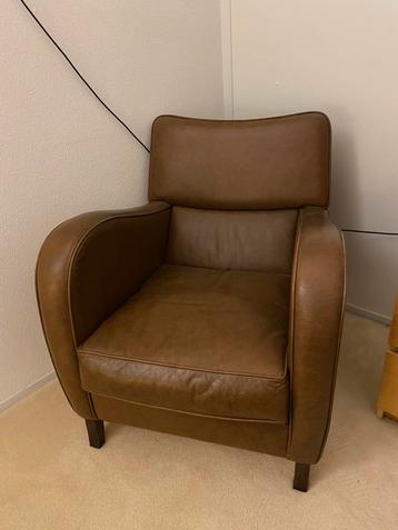 Art deco lederen fauteuil beschikbaar voor biedingen