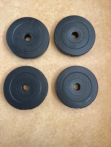 Halterschijven kunststof 4 x 2,5 kg in zeer goede staat beschikbaar voor biedingen