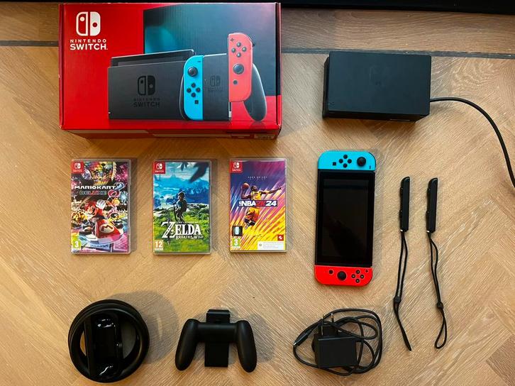 Nintendo Switch (2021) Rood/Blauw + Games en Accesoires, Spelcomputers en Games, Games | Nintendo Switch, Zo goed als nieuw, Overige genres