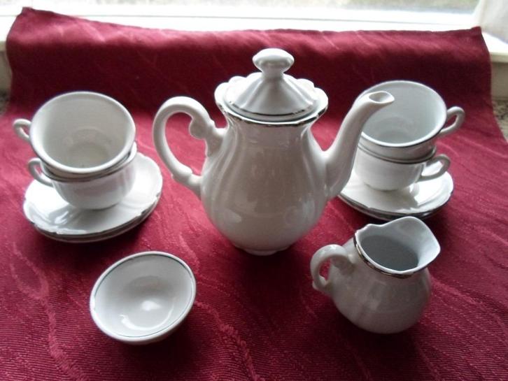 Oud kinderserviesje. Porselein. Zilverlijn. Douwe Egberts., Verzamelen, Speelgoed, Gebruikt, Ophalen of Verzenden