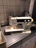 Naaimachine met koffer, Ophalen
