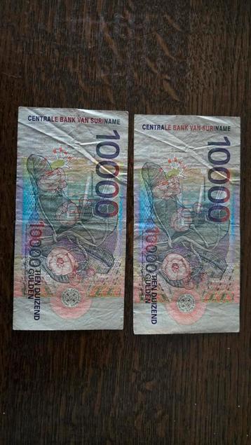 2x 10.000 Gulden Suriname beschikbaar voor biedingen