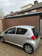 Toyota Aygo 1.0 12V Vvt-i 5DRS 2007 Grijs, Auto's, Toyota, Voorwielaandrijving, Zwart, 4 stoelen, 68 pk