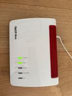 Fritzbox 7590 incl adapter zo goed als nieuw, Computers en Software, Routers en Modems, Ophalen of Verzenden, Zo goed als nieuw