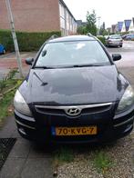 Hyundai i30 1.4i Cvvt 109pk Blue 2010 Zwart, Auto's, Voorwielaandrijving, 4 cilinders, 1396 cc, Zwart