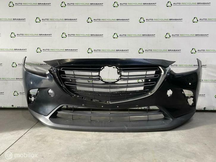 Voorbumper Mazda CX-3 MET GRILL 16W - BLACK ORIG DK8A-50031, Auto-onderdelen, Carrosserie en Plaatwerk, Bumper, Voor, Gebruikt