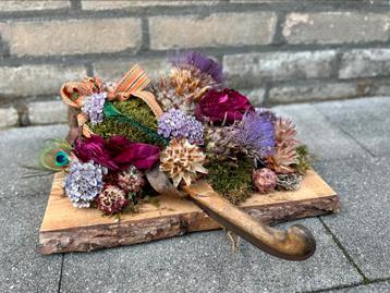 Bloemstuk met schaats beschikbaar voor biedingen