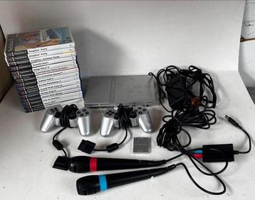 Playstation 2 slim silver 2 conteollers games en singstar beschikbaar voor biedingen