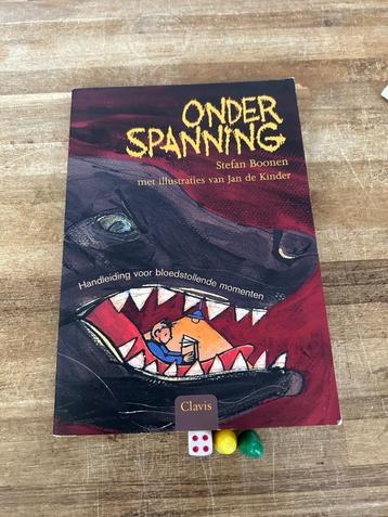 Onder spanning softcover beschikbaar voor biedingen