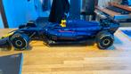 Raster f1 auto met stickers en boekje, Ophalen of Verzenden, Zo goed als nieuw, Overige merken