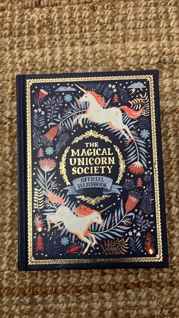 The magical unicorn society - official handbook  beschikbaar voor biedingen