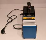 Mokkenpers voor sublimatie., Ophalen