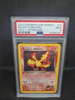 Rocket's Moltres Holo 1st Edition Gym Heroes PSA 9, Hobby en Vrije tijd, Verzamelkaartspellen | Pokémon, Ophalen of Verzenden