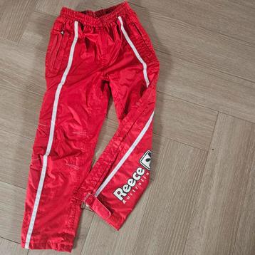 Regenbroek Reece maat 128 beschikbaar voor biedingen