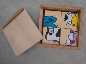 6 houten dierenpuzzels in houten doosje beschikbaar voor biedingen
