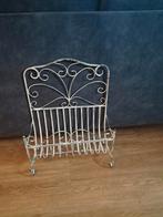 Ijzeren kranten bak / mand, Ophalen