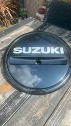 reservewiel cover Suzuki Jimmy, Ophalen