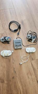 SNES Mini met heel veel spelletjes, incl. N64, Spelcomputers en Games, Ophalen of Verzenden, Zo goed als nieuw