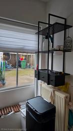 Ijzer keukenrek, Ophalen