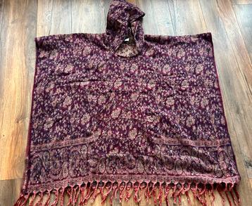Poncho beschikbaar voor biedingen