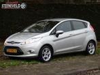 Ford Fiesta 1.25 Titanium met Airco en Radio (bj 2012), Keurmerk '100% Onderhouden', Euro 5, Stof, 1242 cc