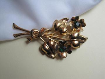 Broche Coro bloemen goudkleurig verguld / groene rijnstenen. beschikbaar voor biedingen