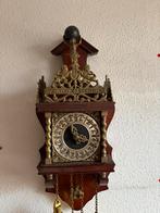 Zaanse klok, Ophalen