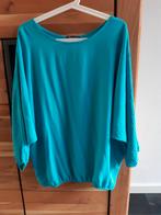 Turquoise blouse, one size. Vleermuismodel. Nieuw, Kleding | Dames, Blouses en Tunieken, Ophalen of Verzenden, Nieuw, Maat 42/44 (L)