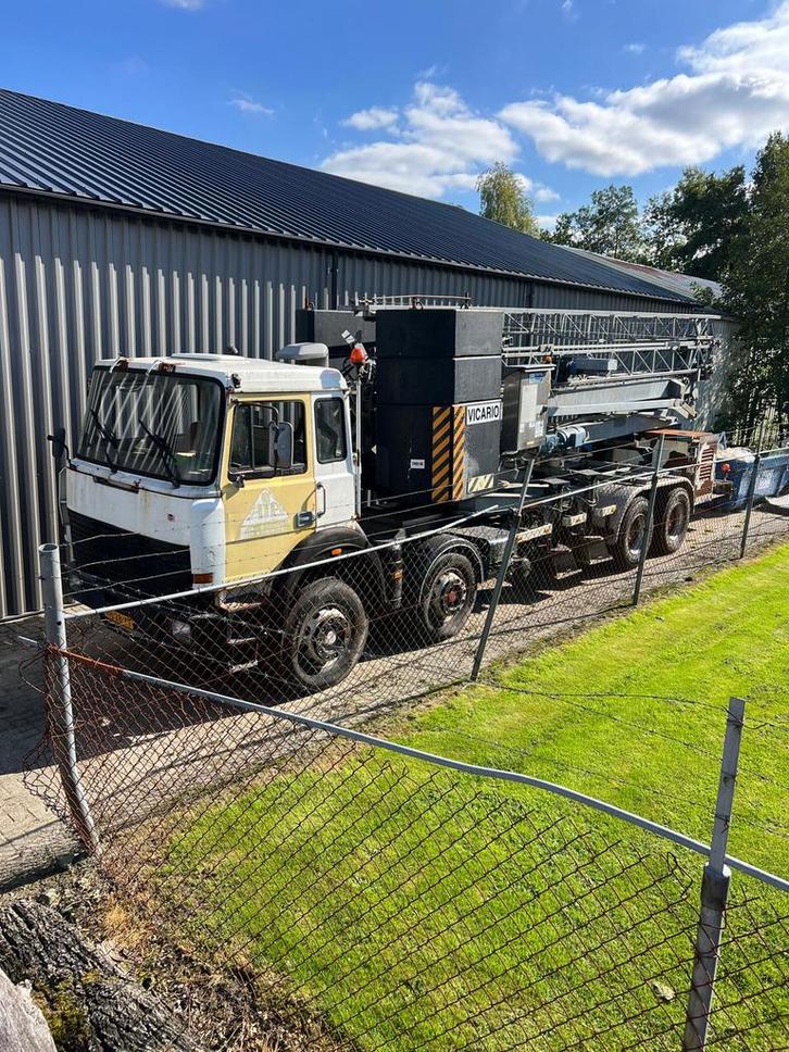 Bouwkraan met vrachtwagen vicario, Zakelijke goederen, Machines en Bouw | Kranen en Graafmachines, Hijswerktuig, Ophalen