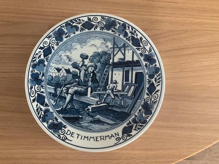 Delfts Blauw Sierbord "De Timmerman", Antiek en Kunst, Antiek | Wandborden en Tegels, Ophalen of Verzenden