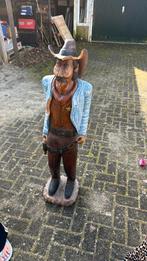 Cowboy beeld hout, Ophalen