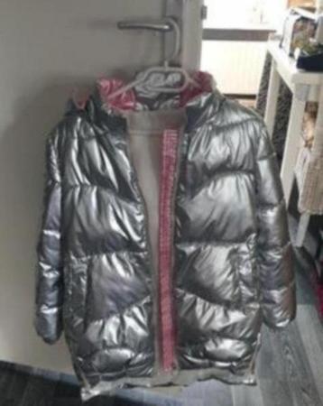 Te koop dikke winterjas dames  zilver maat L  beschikbaar voor biedingen