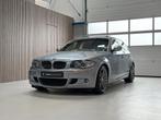 BMW 1-serie 130i High Executive LCI - AUTOMAAT - SCHUIFDAK -, Achterwielaandrijving, Gebruikt, Zwart, Blauw